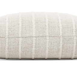 Textured pillow with horizontal stripes on a white background